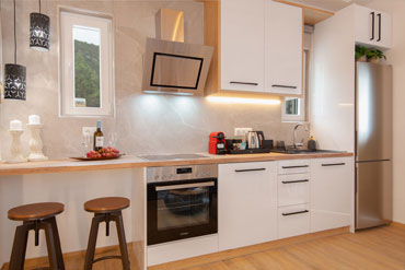 Fully equipped kitchen at Sunset coast house wood