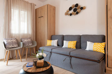 The lounge of the Sunset coast house wood in Sifnos