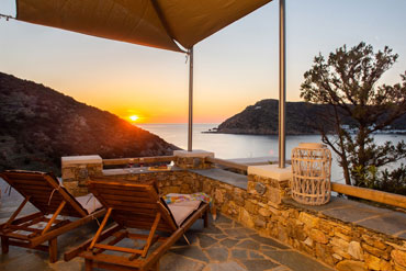 Large terrace with sun loungers and sunset views
